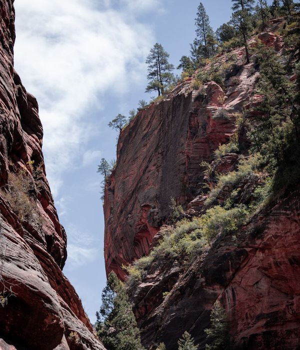 Majestic red rock formations of Charyn Canyon under clear blue sky
